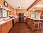 Fully Equipped Main Level Kitchen with Bar Sitting